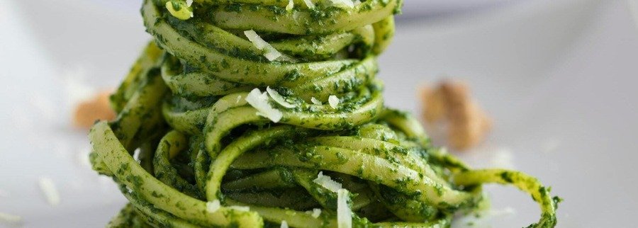 Fresh pesto pasta dish from Liguria with basil sauce and parmesan