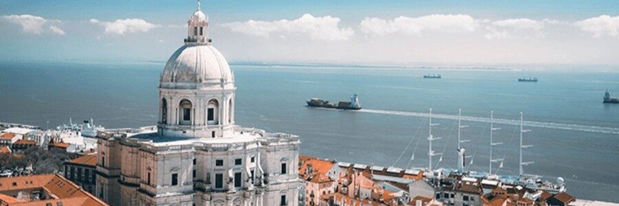 Dome of the National Pantheon overlooking Lisbon rooftops and the Tagus River