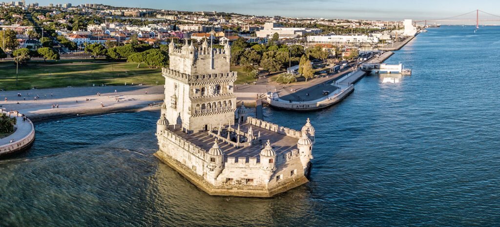 View of Belém Tower along Lisbon Port and the Tagus Coast at sunset