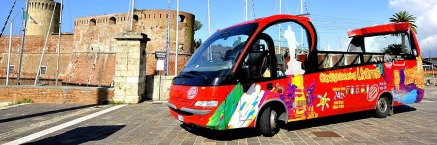Colorful shuttle bus at Livorno port near cruise terminal in Italy