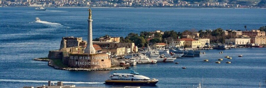 Ferry arriving at Messina port with harbor views in Sicily