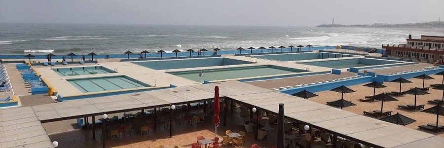 Saltwater pools and oceanfront terrace at Miami Beach Club along Casablanca’s Corniche.