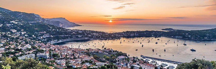 Nice Port at sunset with harbor, boats, and coastal views along the French Riviera