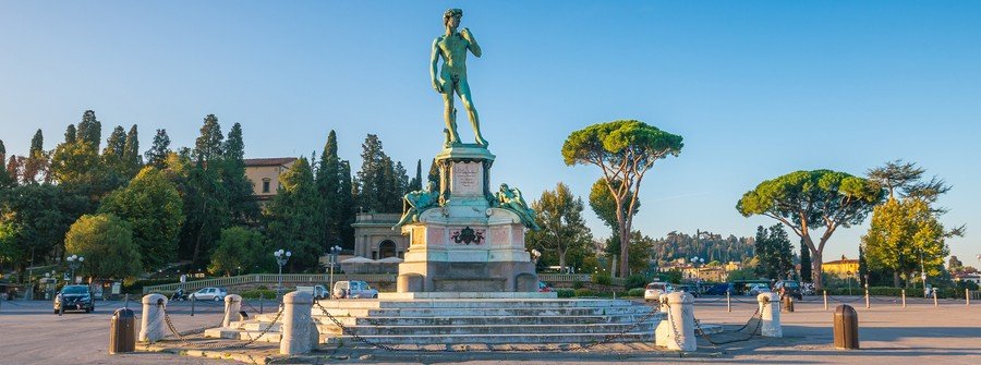 Statue of David at Piazzale Michelangelo overlooking Florence skyline