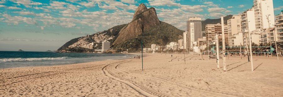 Playa de Huelin beach in Málaga with wide sandy shoreline and calm Mediterranean views near the cruise port