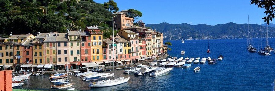 Portofino Piazzetta with waterfront cafes and boats in the harbor