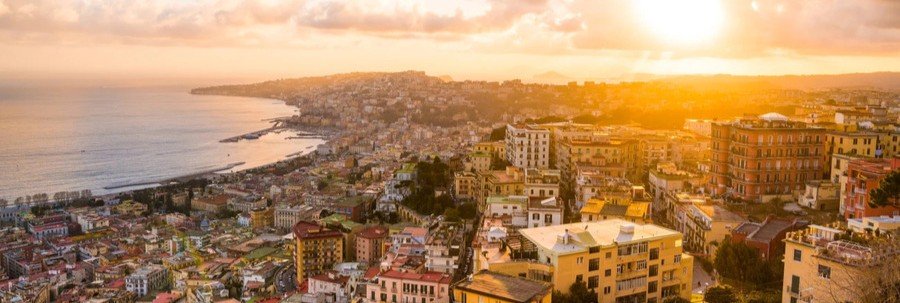 Ravenna Italy sunset over coastline and city buildings