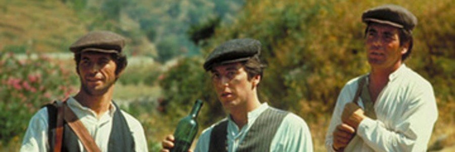 Traditional Sicilian coppola hats worn by men outdoors