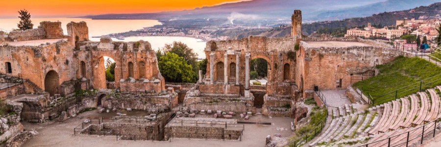 Ancient Greek theater in Taormina overlooking the sea and coastline