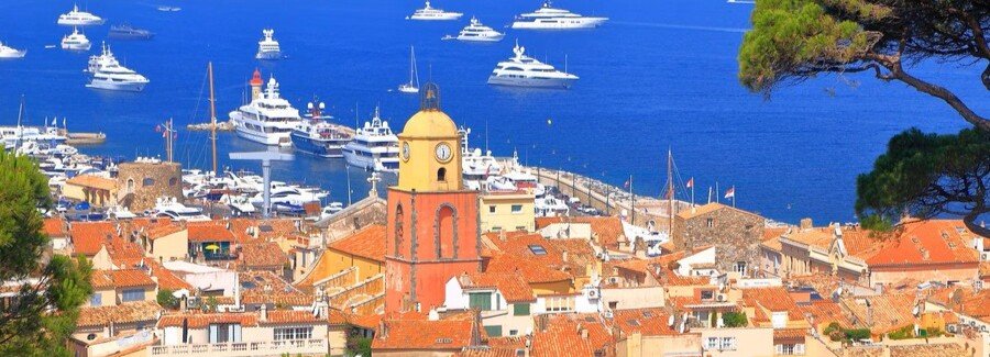 Toulon harbor and Old Town with colorful buildings and yachts along the waterfront