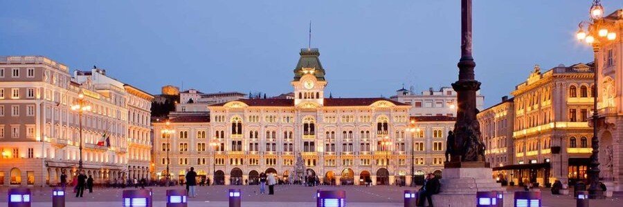 Piazza Unità d’Italia near Trieste Port at sunset with historic buildings