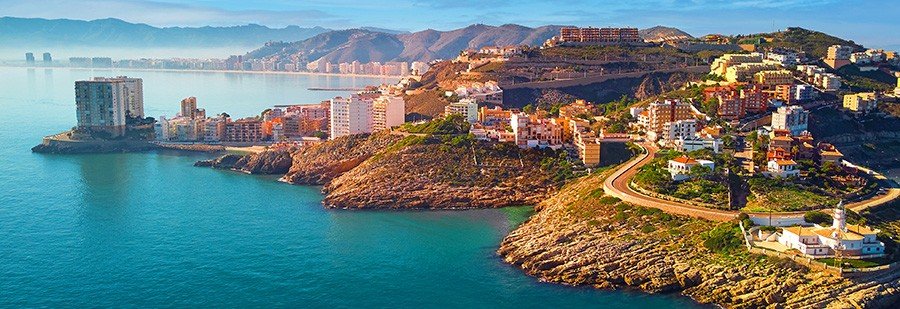 Valencia Spain coastline panoramic view with hills, city buildings, and Mediterranean sea