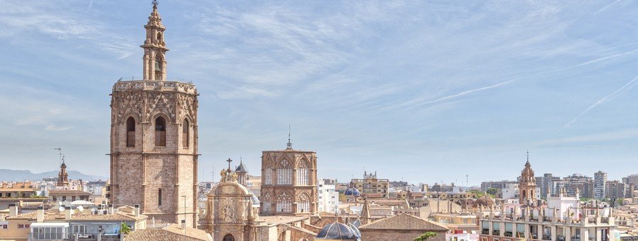Valencia city view from Miguelete Tower with cathedral rooftops and skyline