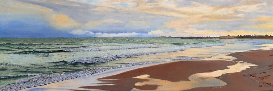 Playa de Pinedo near Valencia Port with sandy shoreline and calm Mediterranean waves