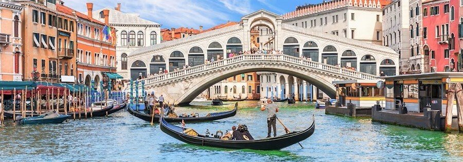 Gondola ride on the Grand Canal near Rialto Bridge in Venice