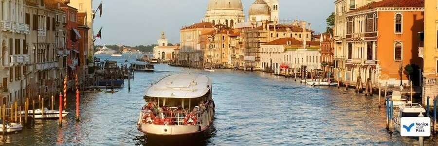 Vaporetto water bus traveling along the Grand Canal in Venice
