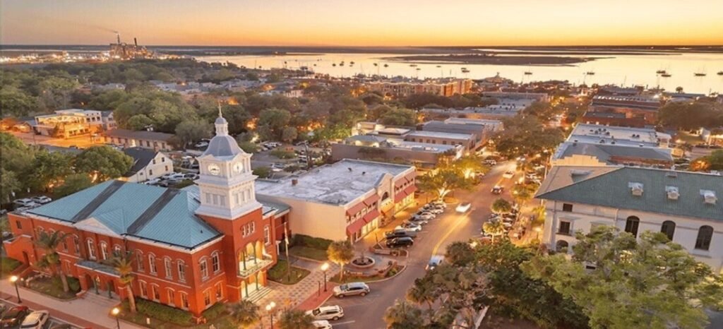 Aerial sunset view of historic downtown Fernandina Beach on Amelia Island Florida showing the historic courthouse clock tower and marina