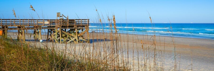 Wooden beach boardwalk leading to Atlantic Beach in Florida
