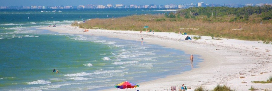 Sandy shoreline and calm coastal waters near DeSoto Park and Grand Canal in Satellite Beach, Florida.