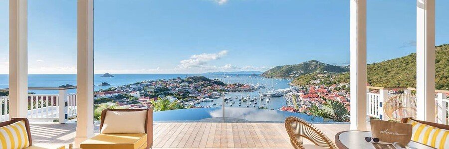 Luxury terrace view overlooking Gustavia Harbor from Fouquet's Saint-Barth in St. Barts.