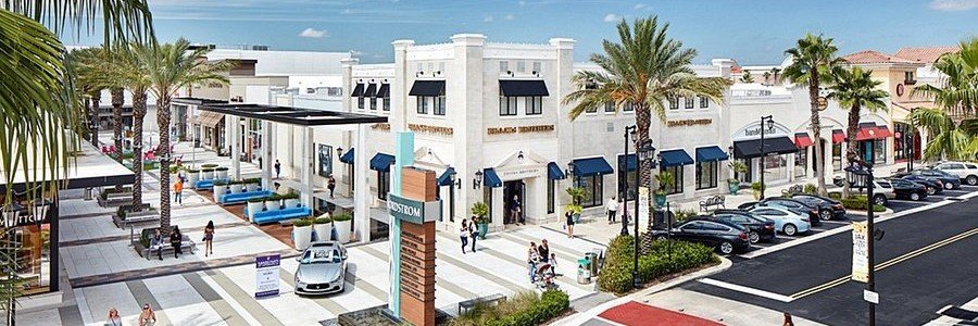 Hampton Inn Jacksonville Ponte Vedra with tropical landscaping, fountain courtyard, and convenient access to nearby beaches.