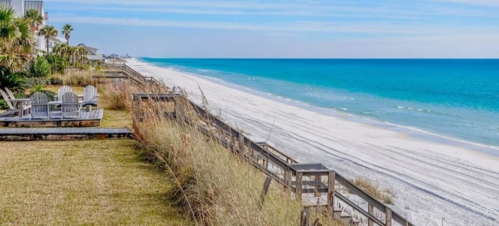 Oceanfront homes overlooking the quiet sandy shoreline at Indian Harbour Beach, Florida.