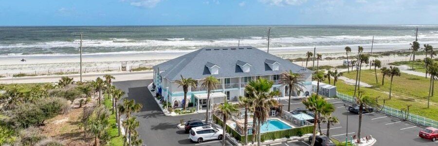 Ocean Sands Beach Boutique Inn on Vilano Beach with ocean views, private beach access, and a heated pool.