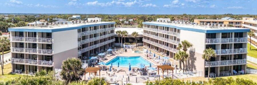 The Beach Club by Cool Vacay on St Augustine Beach with oceanfront condos, pool, and direct beach access.