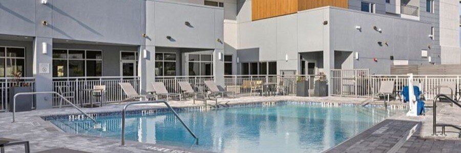 Outdoor swimming pool at TownePlace Suites by Marriott Cape Canaveral.