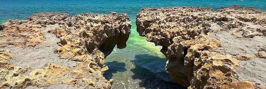 Unique limestone rock formations at Blowing Rocks Preserve in Hobe Sound, Florida overlooking the Atlantic Ocean.