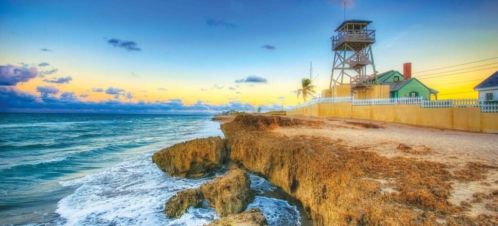 Sunrise over the rocky shoreline beside the House of Refuge on Hutchinson Island