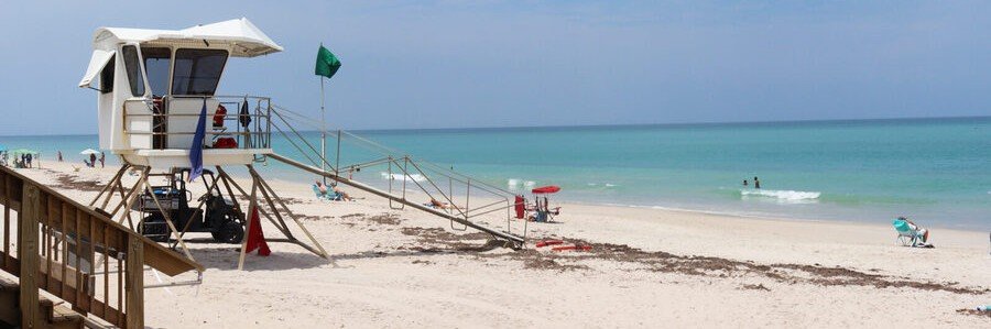Lifeguard tower overlooking the white sand beach at Humiston Beach Park in Indian River Shores, Florida.