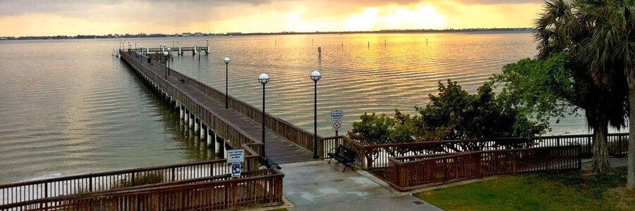 Fishing pier at Indian Riverside Park overlooking the Indian River Lagoon in Jensen Beach, Florida.