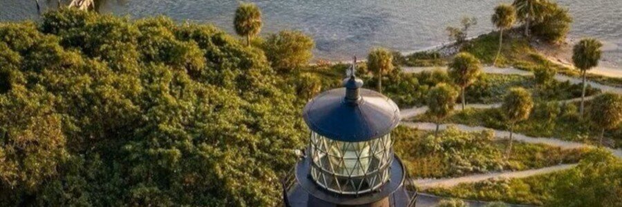 View of the historic Jupiter Inlet Lighthouse overlooking the Intracoastal Waterway near Hobe Sound, Florida.