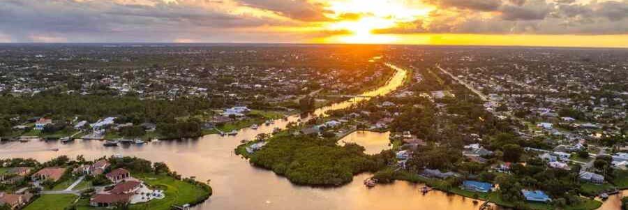 Aerial sunset view over Port St. Lucie and the St. Lucie River in Florida.