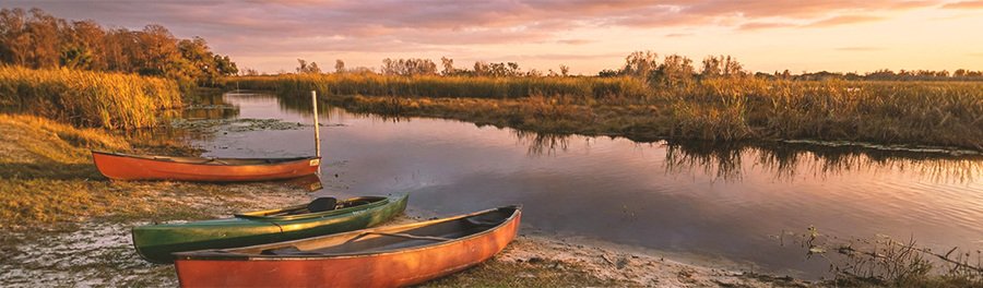 Canoes along the water at Savannas Preserve State Park near Port St. Lucie, Florida.