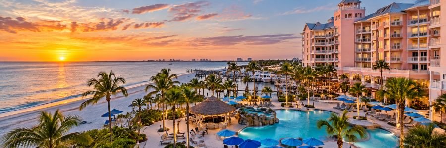 Pink Shell Beach Resort & Marina overlooking Fort Myers Beach at suns