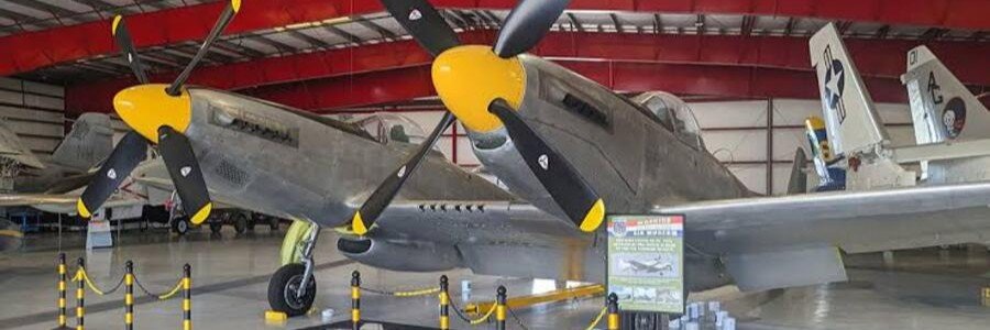 Historic military aircraft displayed inside the Valiant Air Command Warbird Museum in Titusville.