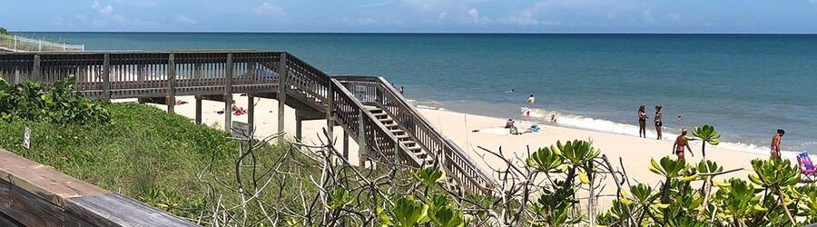 Wooden beach access boardwalk leading to Wabasso Beach Park on Hutchinson Island, Florida.