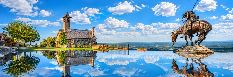 Top of the Rock near Branson with chapel, Native American sculpture, reflecting pool, and Ozark Mountain views