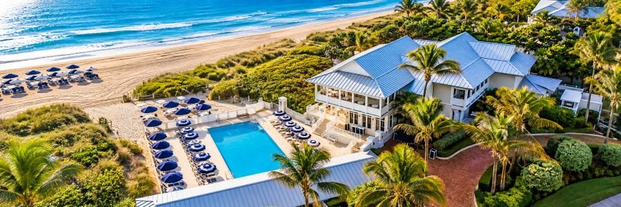The Seagate Hotel Golf & Beach Club The Seagate Beach Club with an oceanfront pool, palm trees and private beach.